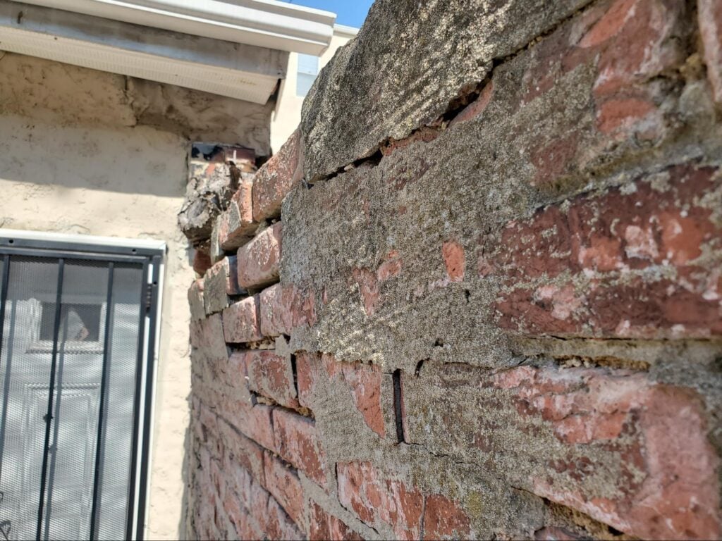 Structural Rigidity In A Historic Brick Wall 9 belly area bricks