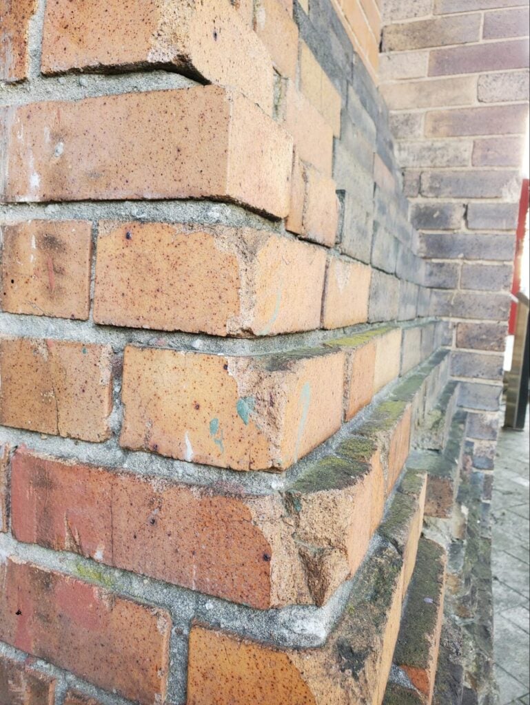 Structural Rigidity In A Historic Brick Wall 7 corbelled base