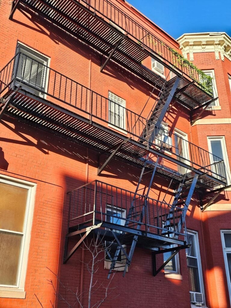 wrought iron fire escape on an old building