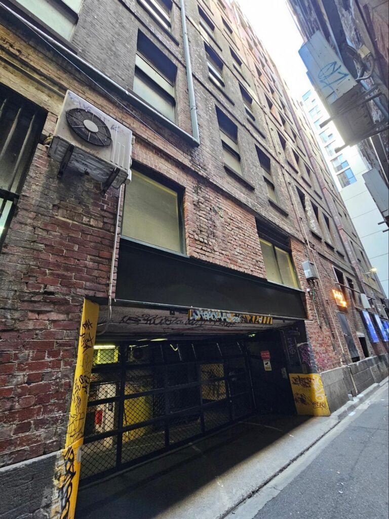 heavy steel and iron girders carrying brick masonry
