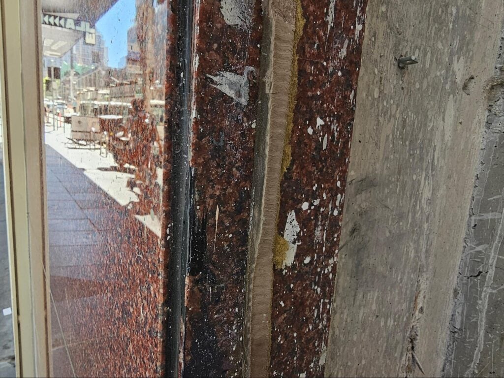 integration of stone veneer cladding panels