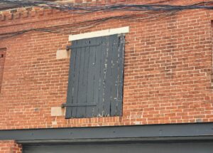 Blog 150 hay doors in historic masonry facades