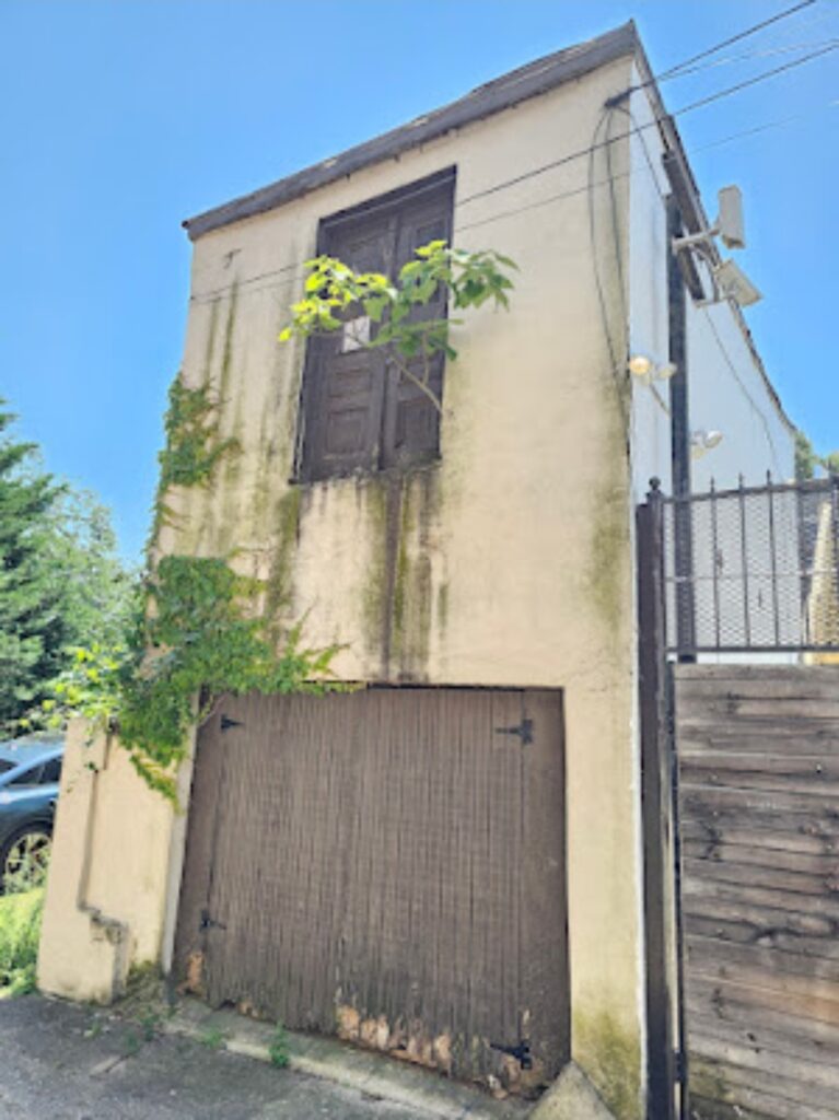 purpose of hay doors in historic masonry facades