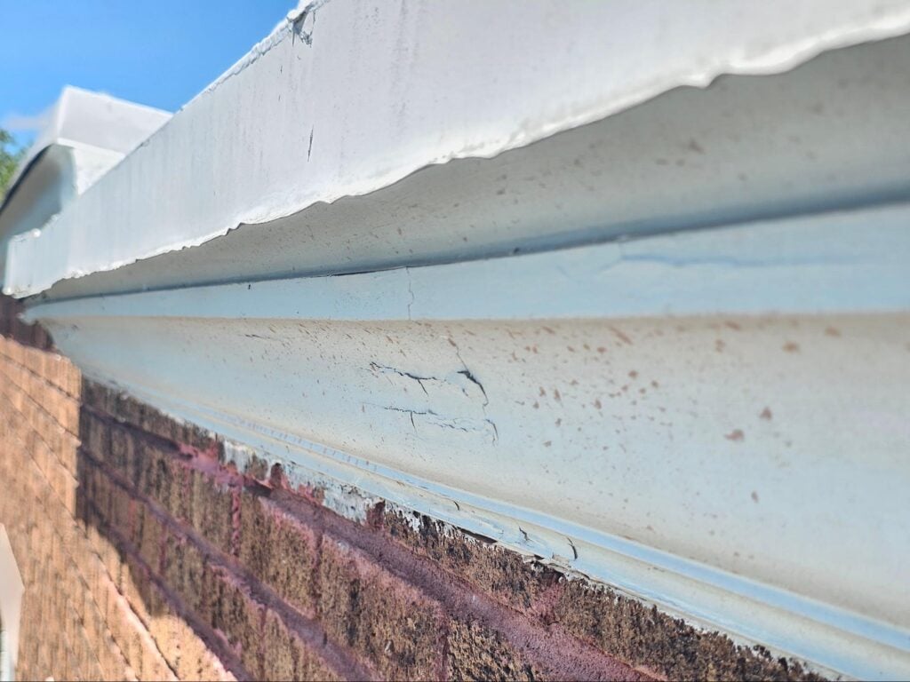 top of a historic brick facade