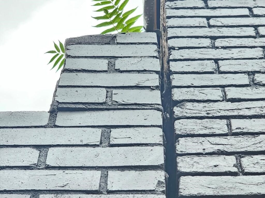 mortar and or an elastomeric sealant - An Old Garage Wall Left Behind