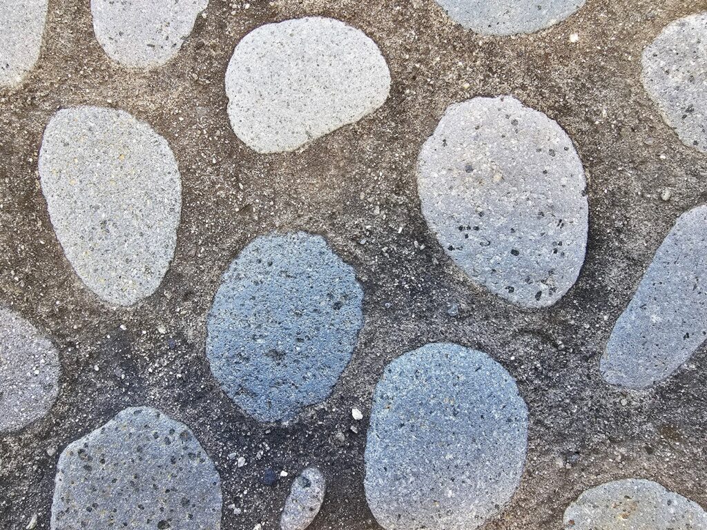 Decorative Rounded Rubble Stone Masonry - Part II 3 small pieces of stone in the mortar joints