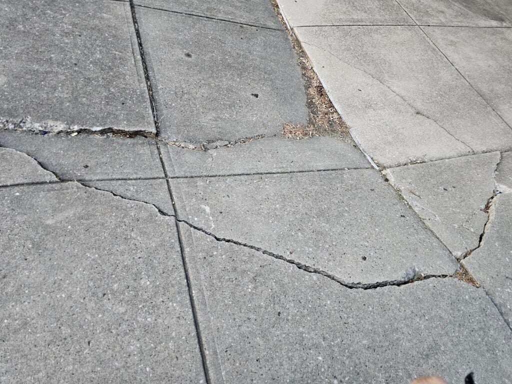 Concrete subgrade washout damage beneath patio slab in Washington, DC