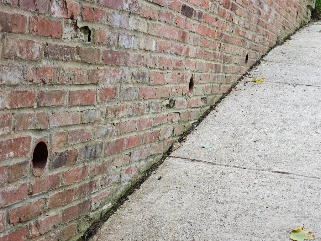 Inspection of retaining wall weeps blockage in Washington DC