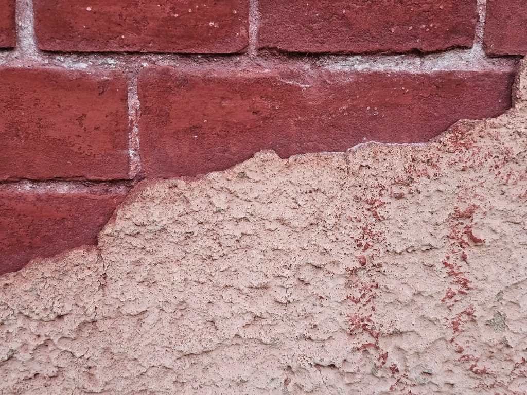 Repairing Historic Brick façade with stucco issues – Washington DC
