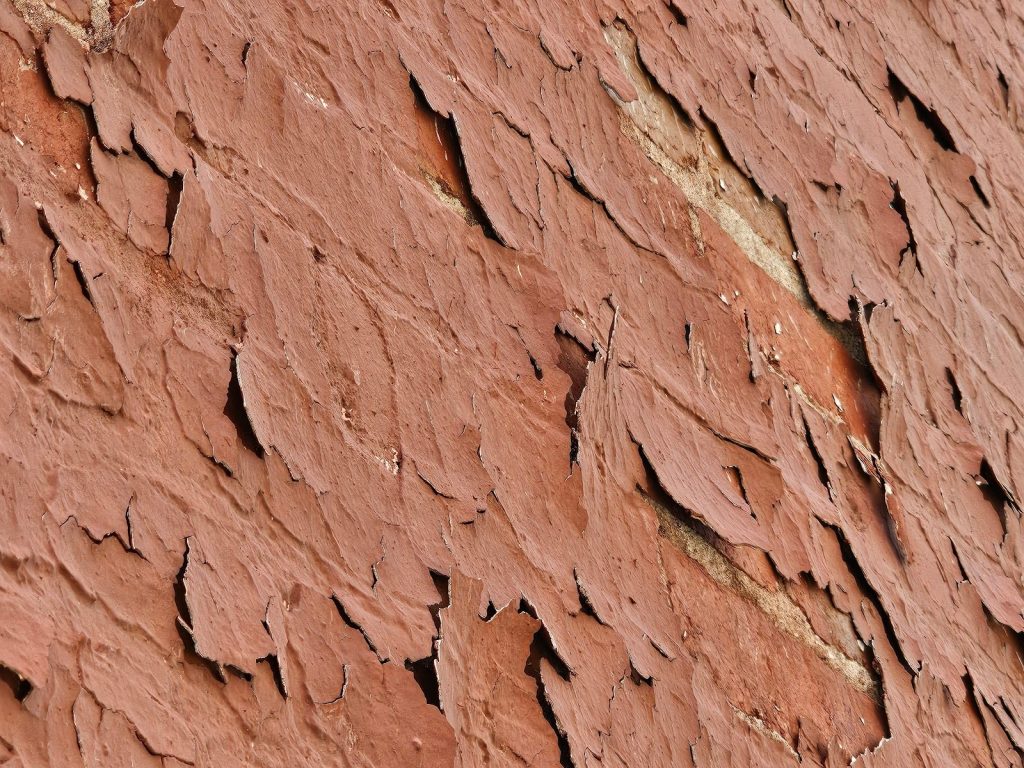 Restoration work being done on worn Paint and Mortar Joints