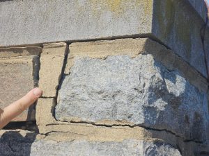 Deteriorated Mortar at a Stone Fence Post - Part II