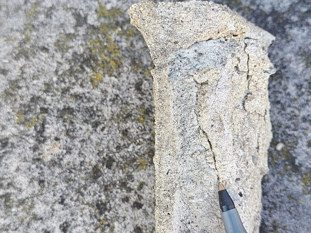 Deteriorated Mortar at a Stone Fence Post - Part II 3 zoomed in view of the mortar joint shows the internal deterioration closely