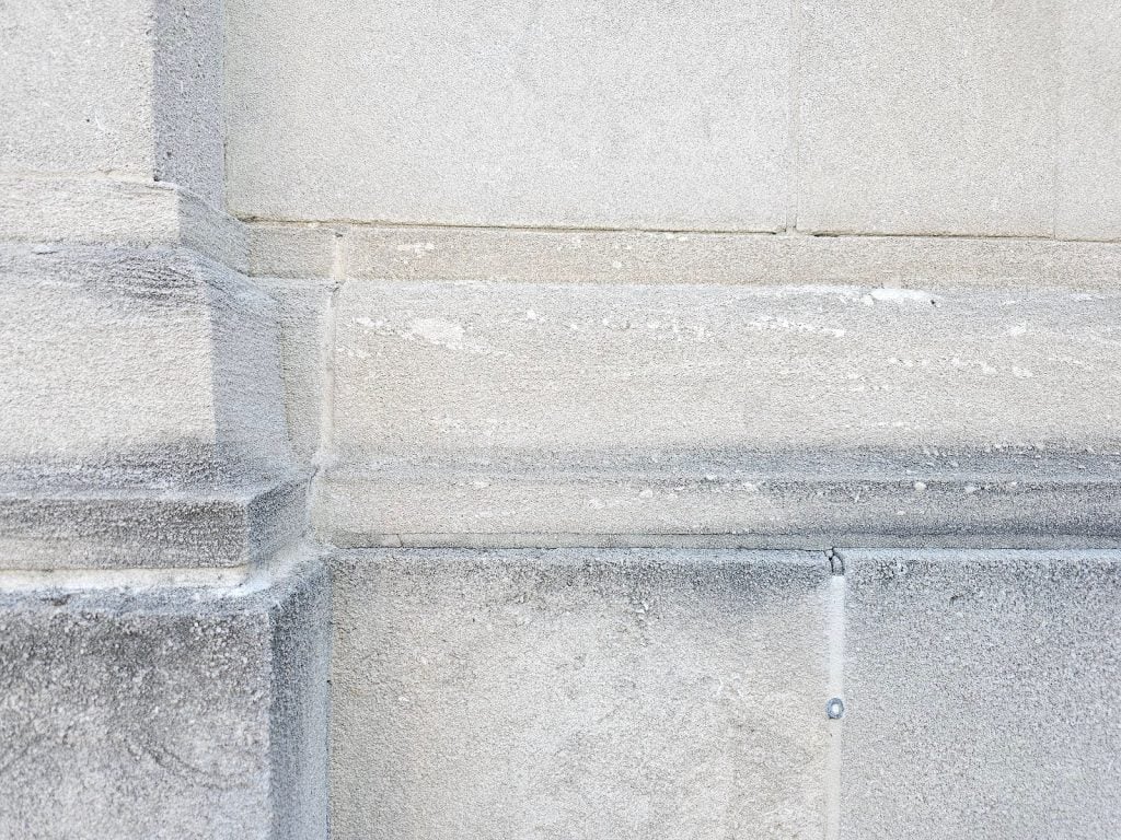 Masonry cavetto molding profile detail in traditional stone construction