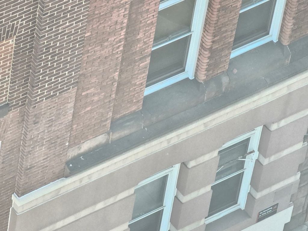 Projecting Horizontal Bands in Masonry Facades - Part II 2 installation of that lower level facade