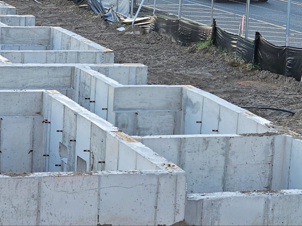 series of building foundations that are assembled in a row