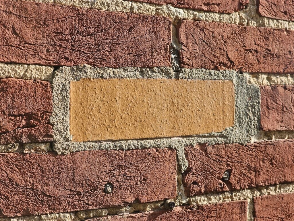 Poorly Matching Brick Replacement 3 Close-up of mismatched bricks after repair work on residential property in Washington DC