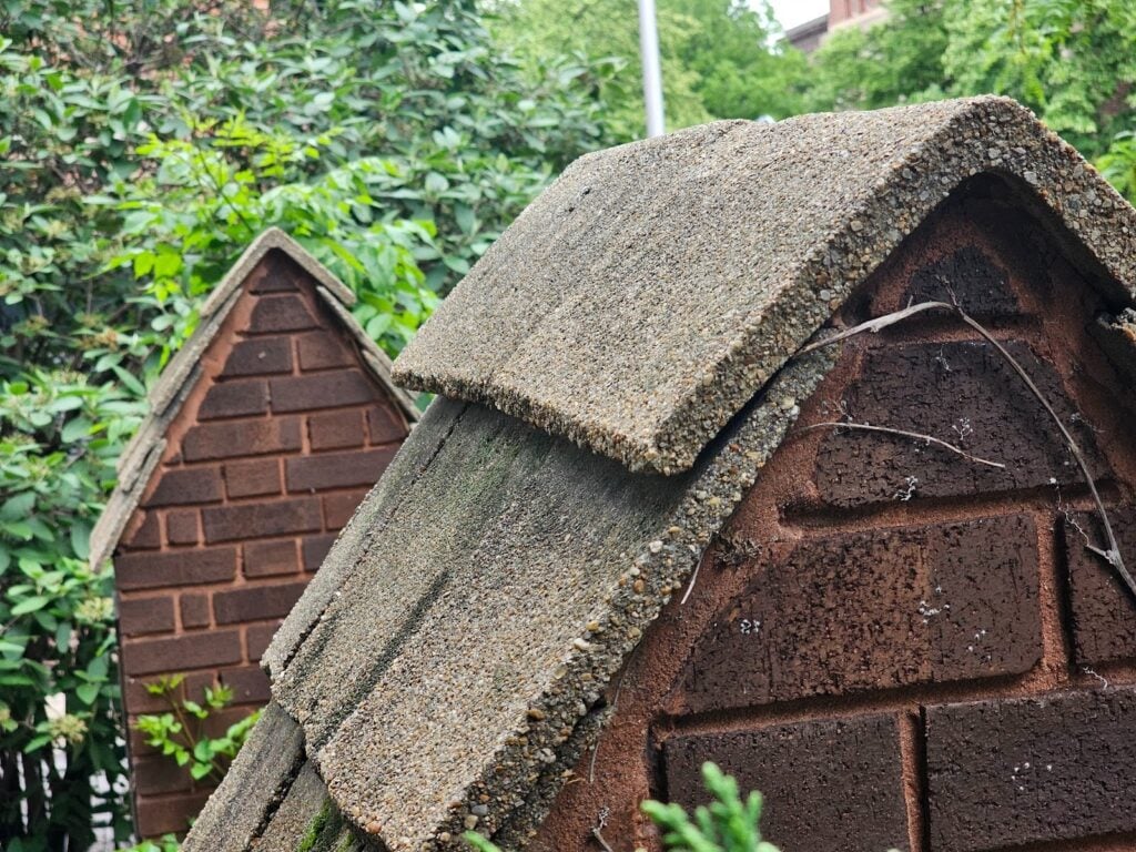 Decorative concrete shingles applied to structural column caps