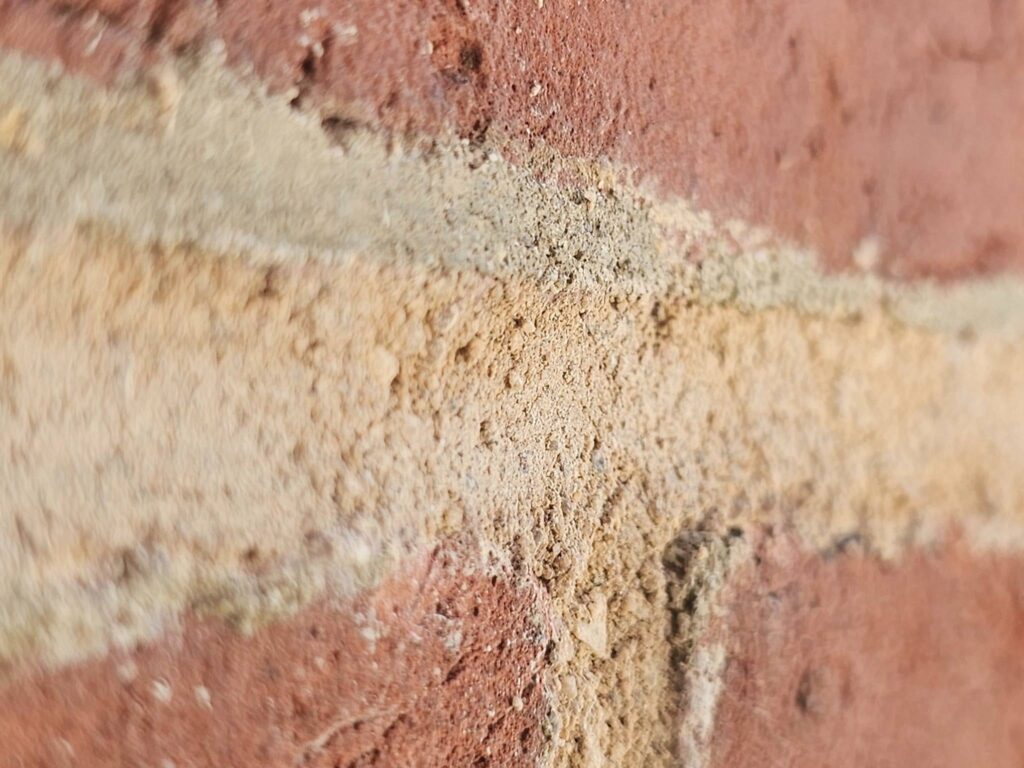 Detailed view of repointed heritage brickwork improving structural integrity and appearance