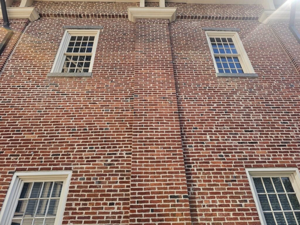Well-maintained brick facade featuring durable concave mortar joints