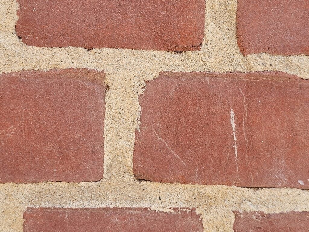 harder mortar with historic brick