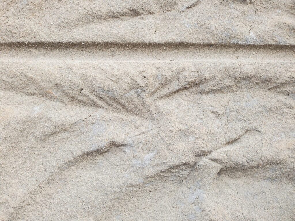 Formstone Coverings over Historic Brick - Part I 3 Close-up of Formstone covering original brick masonry on a historic Washington, DC building