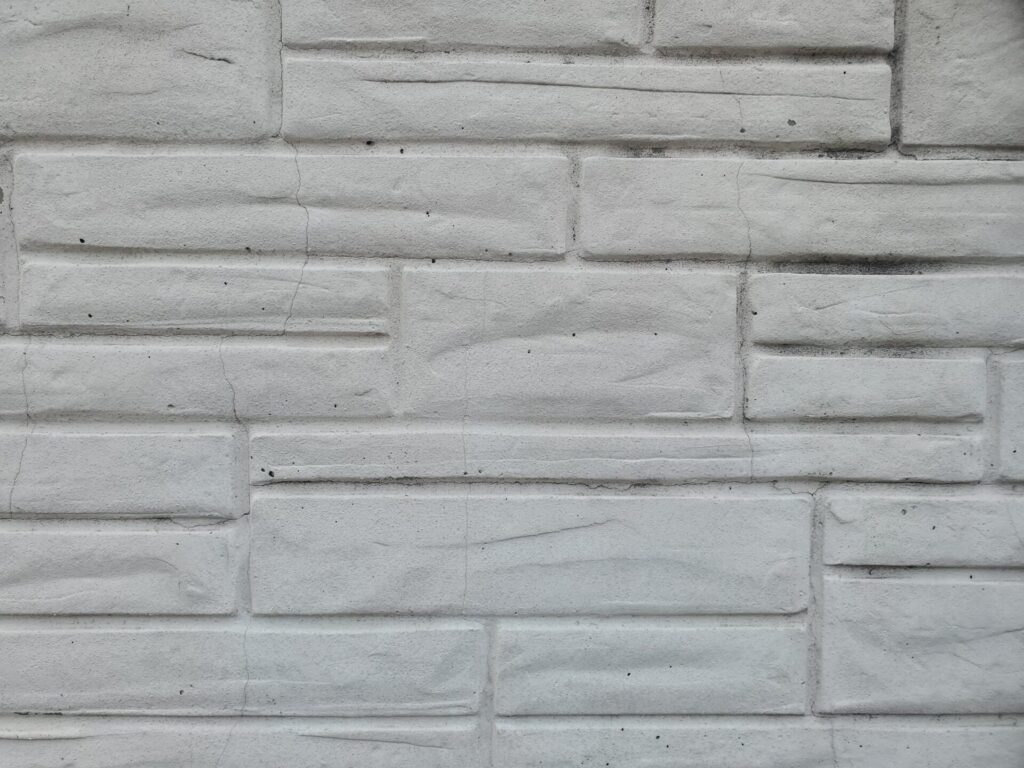 Formstone Coverings over Historic Brick - Part II 2 Close-up of formstone applied over historic brick masonry