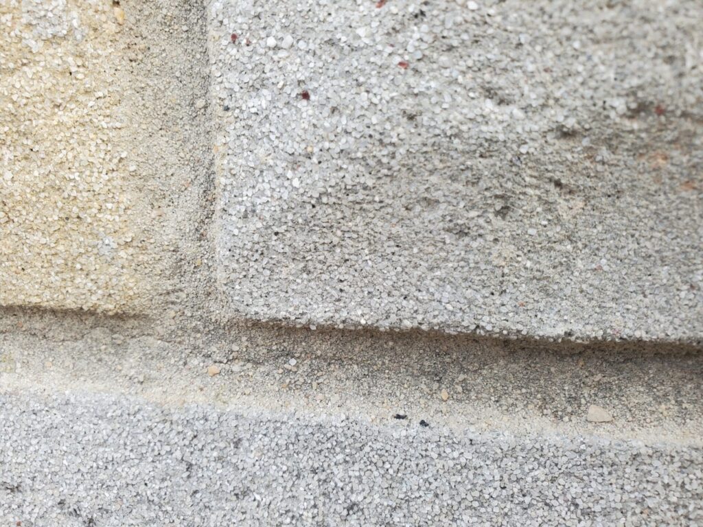 Formstone Coverings over Historic Brick - Part I 6 Historic Washington, DC brick building with Formstone covering showing signs of wear and cracking