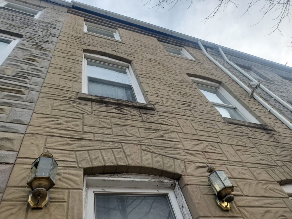 Formstone Coverings over Historic Brick - Part I 2 Historic brick wall covered with Formstone veneer on a Washington, DC rowhouse before restoration