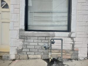 Historic masonry showing signs of poor workmanship and damage