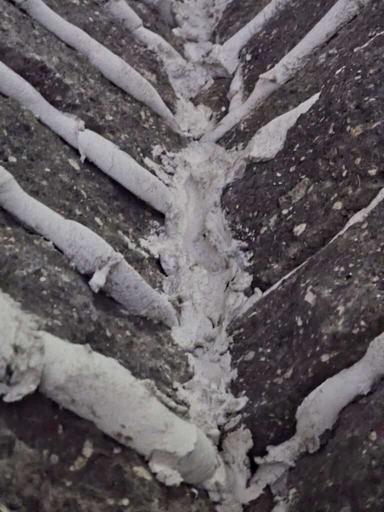 Extruded Mortar Joints - Part II 5 Dried extruded mortar overlapping vintage bricks